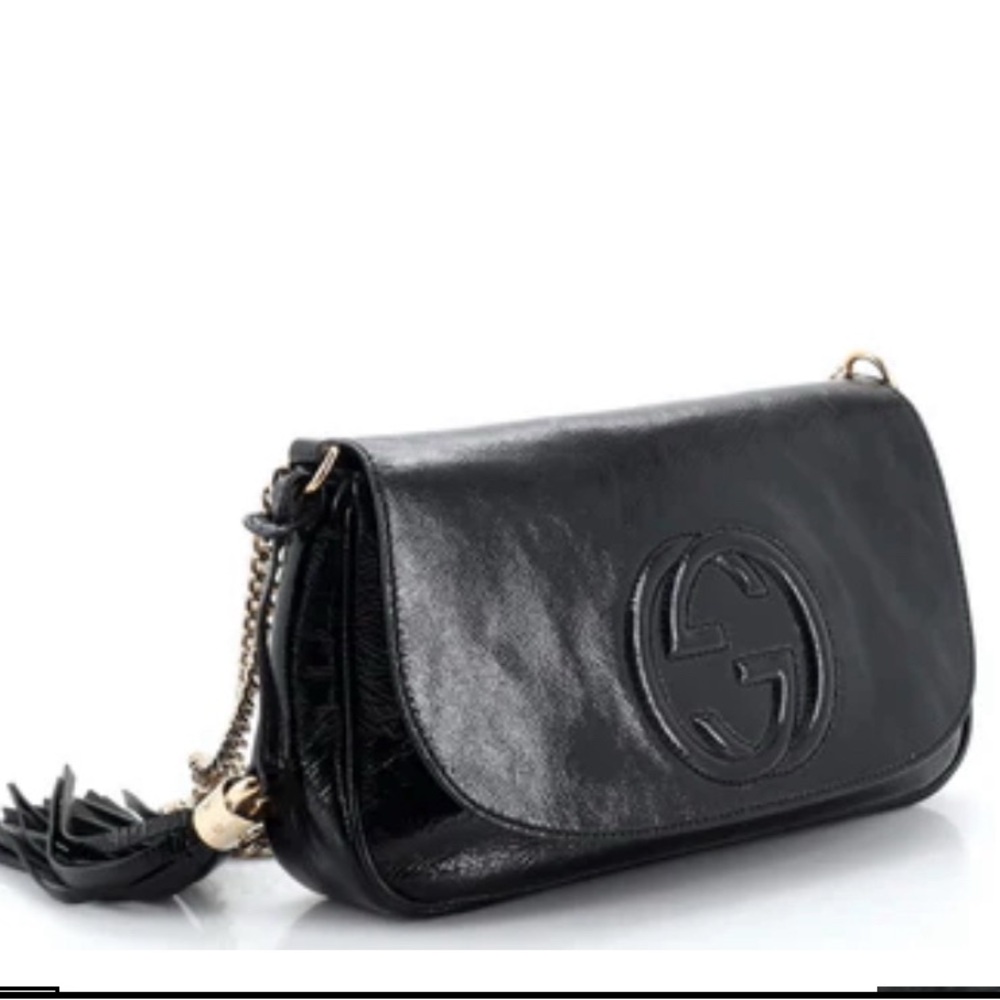 Gucci Black Leather Clutch with Gold Accents